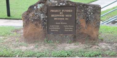 Stone plaque which says project funded by Ricewood MUD December 2011 and lists Board Members, Jacque Freeman, Stephen Marcum, Carrie Prudhomme, Thomas Shott, Denise Posey, and Elaine Mundy.