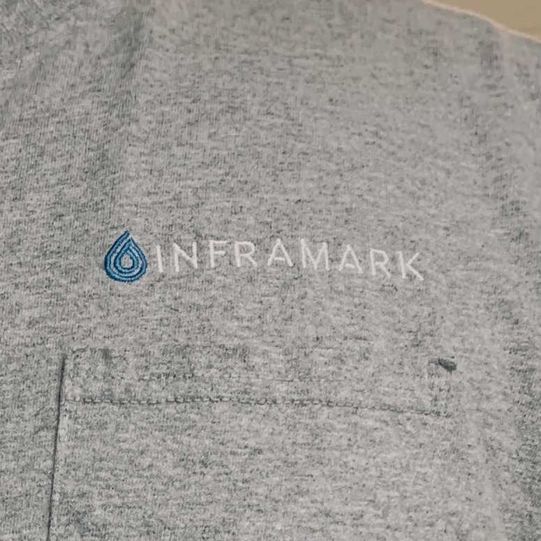 Inframark uniforms vary with the weather, but will always have this logo on the left breast.